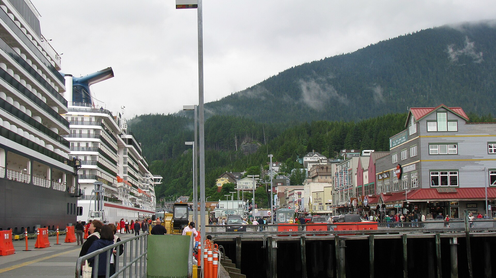 The Ketchikan waterfront and town beneath forested mountains